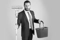 Office cleaning service. broom and bucket in hand of bearded man or businessman Royalty Free Stock Photo