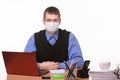 The office clerk from a medical mask sweats glasses