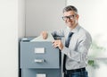 Office clerk searching files Royalty Free Stock Photo