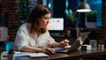 Office clerk wincing at laptop screen, feeling annoyed Royalty Free Stock Photo