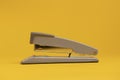 Office concept with gray old fashioned vintage stapler