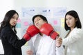 Office conflict between smart man and beautiful asian woman. Fighting in the office with team colleague