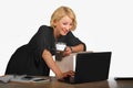 Office corporate portrait of young beautiful and happy business woman working relaxed at laptop computer desk smiling confident in Royalty Free Stock Photo