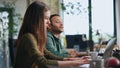 Office coworkers brainstorming sitting conference room with laptops close up. Royalty Free Stock Photo