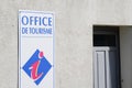 Office de tourisme logo sign wall building means information center in french for tourist tour help Royalty Free Stock Photo