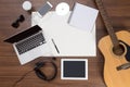 Office desk background acoustic guitar and headphones recording Royalty Free Stock Photo