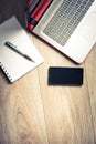 Office desk Background concept. Business computer empty office table with desktop laptop, cell phone and pad