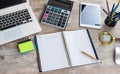 office desk background with laptop, empty notepad, pen calculator and supplies Royalty Free Stock Photo