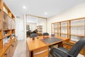 Office desk with chairs and bookcases in Encino, CA