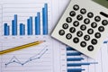 Office desk with charts , histograms and financial documents Royalty Free Stock Photo