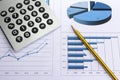 Office desk with charts , histograms and financial documents Royalty Free Stock Photo