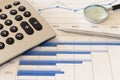 Office desk with charts , histograms and financial documents Royalty Free Stock Photo