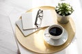 Office desk with coffee cup, succulent plant, eyeglasses and notepad. Minimal style image of business table Royalty Free Stock Photo