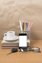 Office desk : coffee and phone with car key,eyeglasses, Royalty Free Stock Photo