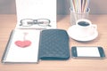 office desk : coffee with phone,wallet,calendar,heart,notepad,eyeglasses,color pencil box,key vintage style