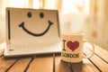 Office desk with computer; coffee cup and smile Royalty Free Stock Photo