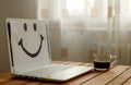 Office desk with computer; coffee cup and smile Royalty Free Stock Photo