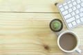 Office desk with copy space. Digital devices wireless keyboard and mouse on office table with notepad and cup of coffee,you can ap Royalty Free Stock Photo