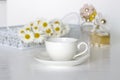 Office desk feminine and daisy flowers Royalty Free Stock Photo