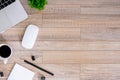 The office desk flat lay view with laptop, mouse, tree, black clip, coffee cup, notebook, pencil on wood texture background Royalty Free Stock Photo