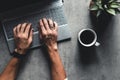 The office desk flat lay view with laptop, mouse, tree, paper clip, coffee cup, notebook, pencil, Royalty Free Stock Photo