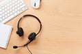 Office desk with headset. Call center support Royalty Free Stock Photo