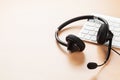 Office desk with headset. Call center support Royalty Free Stock Photo