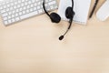 Office desk with headset. Call center support Royalty Free Stock Photo