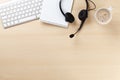 Office desk with headset and pc Royalty Free Stock Photo