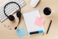 Office desk with headset and supplies. Call center Royalty Free Stock Photo