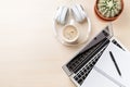 Office desk with laptop, coffee and headphones Royalty Free Stock Photo