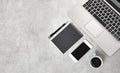 Office desk with laptop, smartphone, cup of coffee. Top view work place with copy space Royalty Free Stock Photo