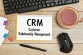 Notebook with text - CRM Customer Relationship Management, near office supplies Royalty Free Stock Photo