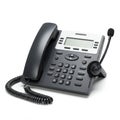 Office desk phone with a coiled cord, numeric keypad, and a digital display screen.