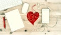 Office Desk with Red Heart, Keyboard, Phone, Headphones. Valenti Royalty Free Stock Photo