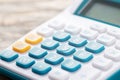 Office desk table calculator with notepad book, bank account and black pen. Royalty Free Stock Photo