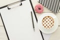 Office desk table with clipboard and cup of coffee Royalty Free Stock Photo