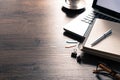 Office desk table with computer, silver pen and black coffee cup Royalty Free Stock Photo