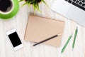 Office desk table with computer, supplies, coffee cup and flower Royalty Free Stock Photo