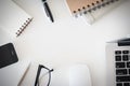 Office desk table with computer, supplies, flower and coffee cup Royalty Free Stock Photo