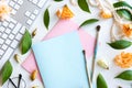 Office desk table with computer, supplies, flower and coffee cup. Top view. life style concept. copy space for text, selective foc Royalty Free Stock Photo