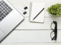 Office desk table with computer, supplies, flower. Top view. Copy space for text Royalty Free Stock Photo