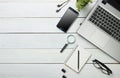 Office desk table with computer, supplies, flower. Top view. Copy space for text Royalty Free Stock Photo