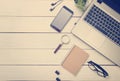 Office desk table with computer, supplies, flower. Top view. Copy space for text Royalty Free Stock Photo