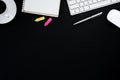 Office desk table with computer, white mouse, silver pen, pink a