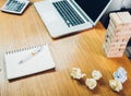 Office desk table have paper crumpled, block wood, laptop computer Royalty Free Stock Photo