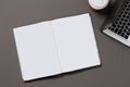 Office desk top view with blank notebook isolated on gray, with clipping path, changeable background Royalty Free Stock Photo
