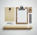 Office elements on white paper background. 3d render