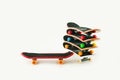 Office entertainment. Fingerboard a skateboard on white background