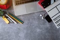 Office equipment with pens, notes, notebooks, tablets, smartphones. Royalty Free Stock Photo